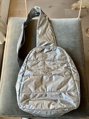 Brand new “Hi Love”  Puffer Crossbody Backpack in Silver